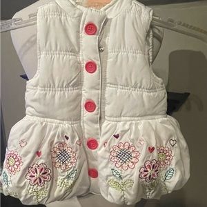 White puffer vest